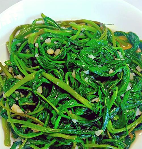 空心菜炒法大揭秘（让你的空心菜炒出绿叶脆茎）  第2张